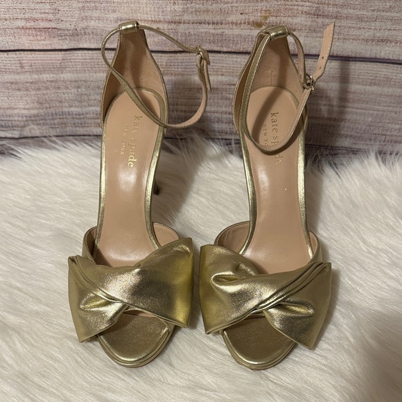 kate spade Shoes - Kate Spade Metallic Gold Bow Heels Size 6B